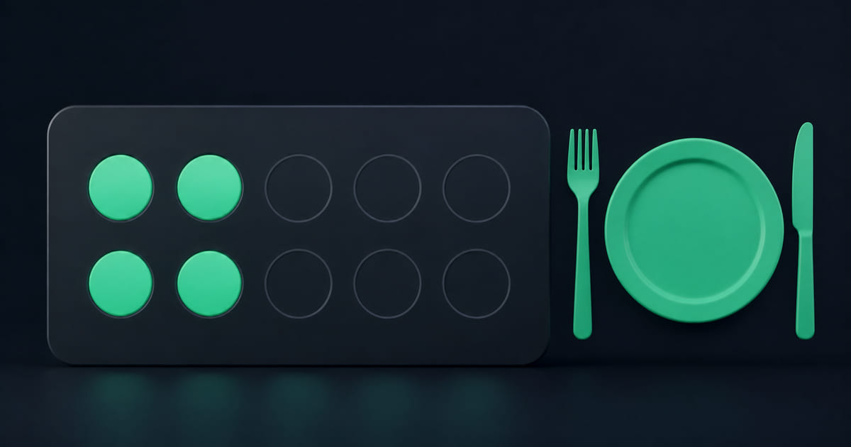 A stamp card with only a few stamps filled beside a plate and cutlery